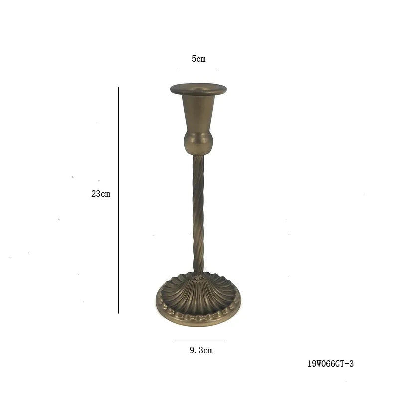 bougeoirs classiques bronze finement sculptés décoration maison vintage élégants fixations