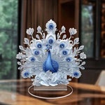 sculpture paon plumes ornements bleus argentés sculpture dragon ailes déployées sculpture loup socle rocheux