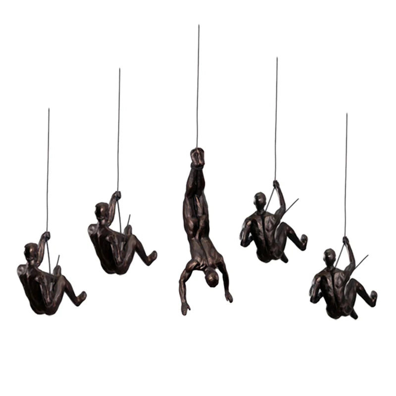 statues suspendues bronze figures humaines mouvement art contemporain décoration intérieure rétro vintage nostalgie