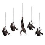 statues suspendues bronze figures humaines mouvement art contemporain décoration intérieure rétro vintage nostalgie