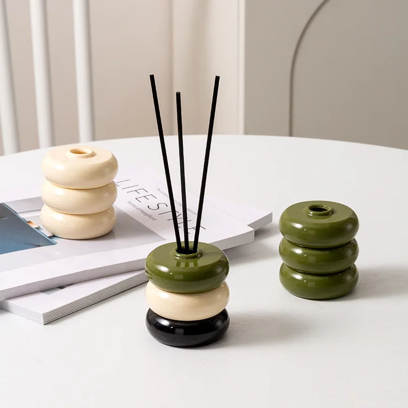 diffuseur huiles essentielles moderne minimaliste rouge jaune bleu noir beige vert géométrique circulaire brillant