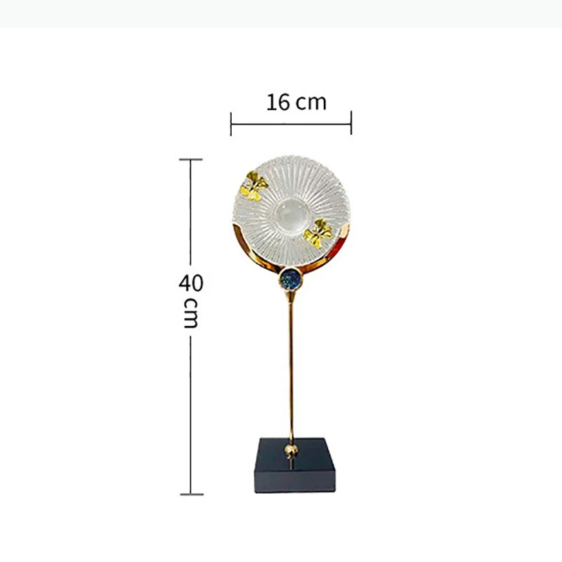 Bougeoir moderne transparent doré papillons bleu rayures base carrée noire tige dorée