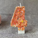bougie anniversaire chiffre orange paillettes multicolores décoration brillante fleur centroide
