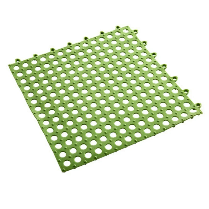 tapis salle bain modulable perforations texturées moderne jaune vert gris fixations noires éléments