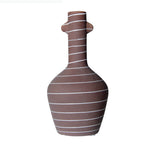 vase céramique moderne brun rougeâtre lignes blanches texture rugueuse minimaliste