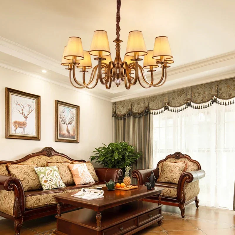 chandelier bronze classique suspension lumière abat jours tissu texturé courbes salle manger