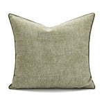 coussin vert olive rayures moderne décoration intérieure blanc motif géométrique noir plissé
