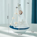 décoration maison bateau voile miniature blanc bleu clair coquillage étoile mer oiseau filet pêche