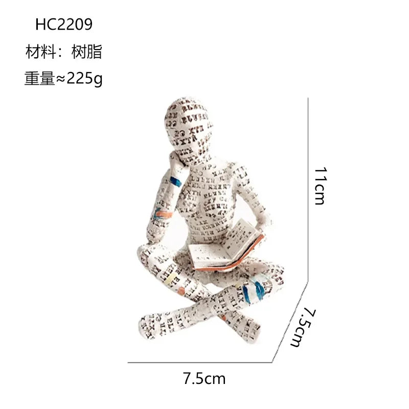 statue résine femme lisant livres colorés art contemporain blanc opalescent pensé thème humains