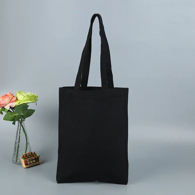 sac main toile réutilisable noir blanc beige classique uni opacité poignées respectueux environnement multifonction