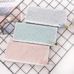 serviette coton bébé rapide absorption noël rose clair vert pastel gris clair points blancs