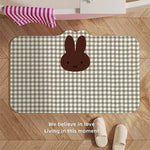tapis sol absorbant rapide anti dérapant salle bain blanc noir points noirs visage lapin