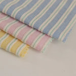 tissu rayé coton polyester bleu rose jaune décontracté pastel opalescent vertical fin rapide respirant