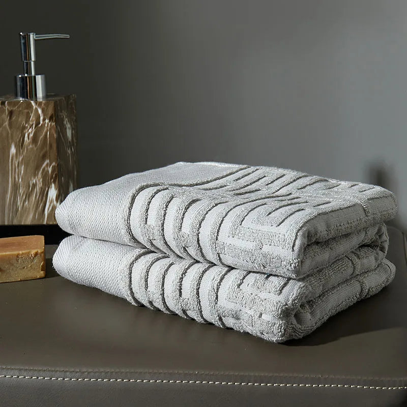 serviette coton absorbante lavable machine motif géométrique gris classique douce utilisation quotidienne