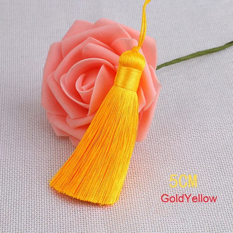 pompons polyester couleur variée 5cm longueur 18cm décoration artisanale rideaux couture pièces