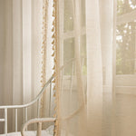 rideau moderne bohème semi transparent beige franges dorées anneaux métalliques intérieur salon chambre