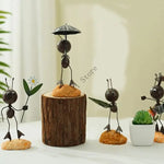 figurine métallique jardin feuilles fleurs décor extérieur moderne artisanal noir bleu vert orange blanc