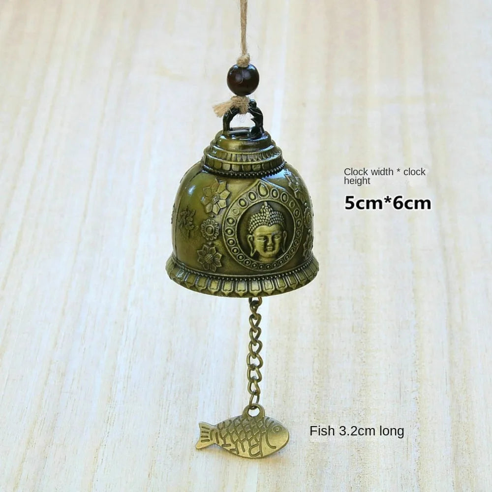 cloche décorative artisanale bronze doré ornements floraux poissons vintage pendentif métallique