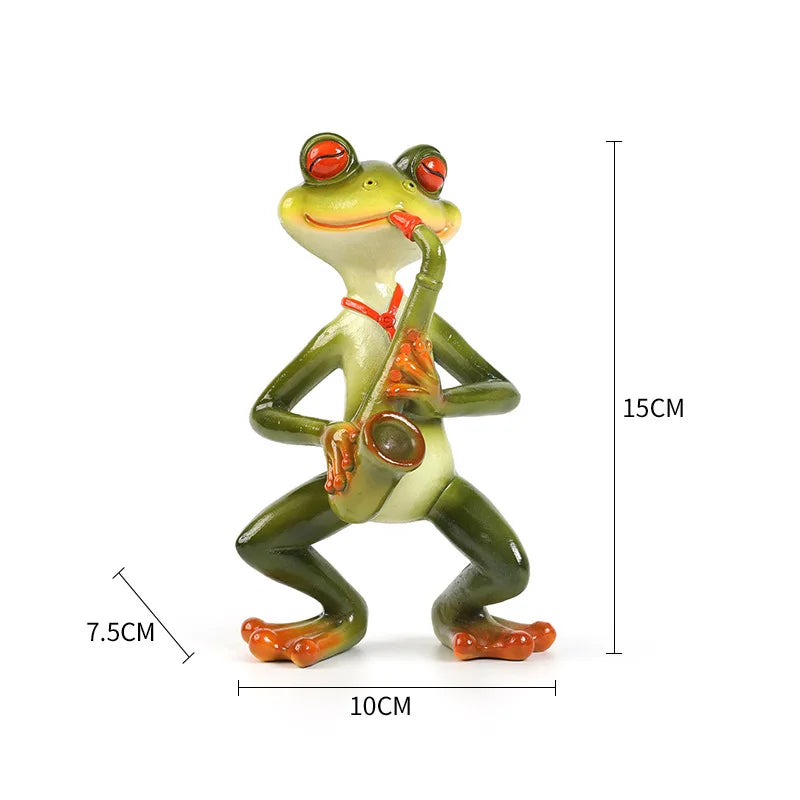 figurines grenouilles instruments vert orange rouge détails sculptés artisanal salon jardin