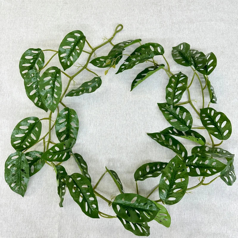 guirlande végétale artificielle feuilles ovales vert veinées tiges extérieure décoration naturelle exposition accrochée