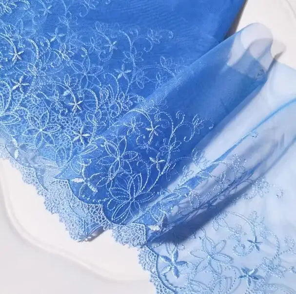 tissu polyester floral bleu marine bleu rouge brodé dentelle ajouré 18cm translucide ecolo 2mètres