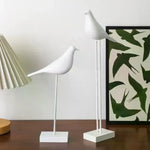 statues oiseaux noir blanc minimaliste sculpture deco intérieur base plate pieds minces