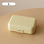 boîte pilules moderne blanc rose compartiments semaines verrouillable pratique adhésif organisateur médicaments portable