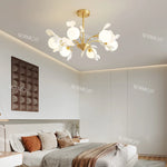 lampe suspendue contemporaine or blanc fleurs opalescente 10 têtes chaîne neutre
