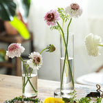vase verre transparent moderne base bois fleurs artificielles inclusion chambre