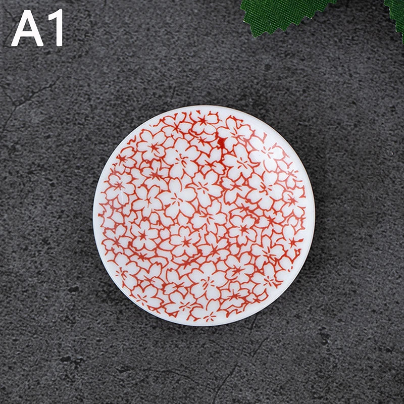 assiettes decoratives assissses fleurs geometriques couleurs multiples blanc vert rouge jaune bleu artisanal