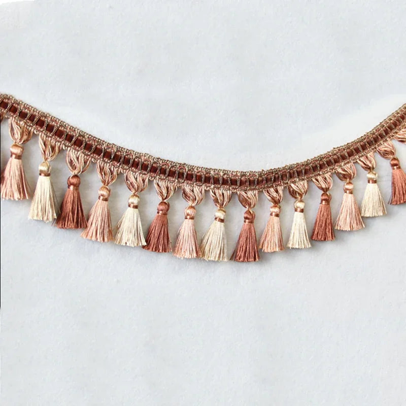 ruban franges polyester rose pâle rose clair gris clair noir beige motifs dorés classique