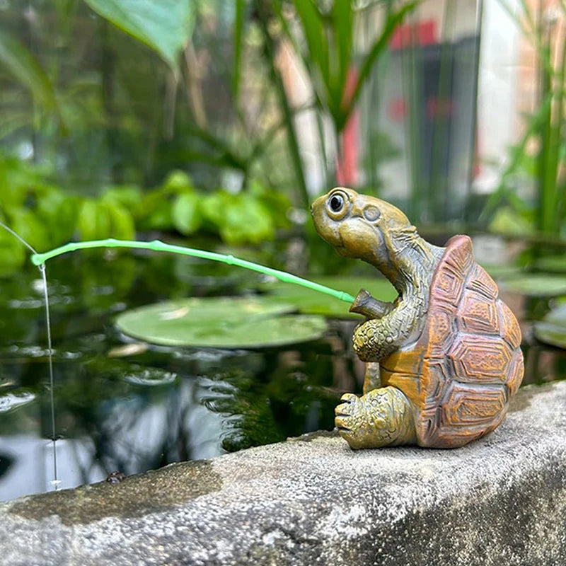 statue tortue pêche canne pêche fil leurre décoration jardin humoristiqueextérieur vert marron orange jaune