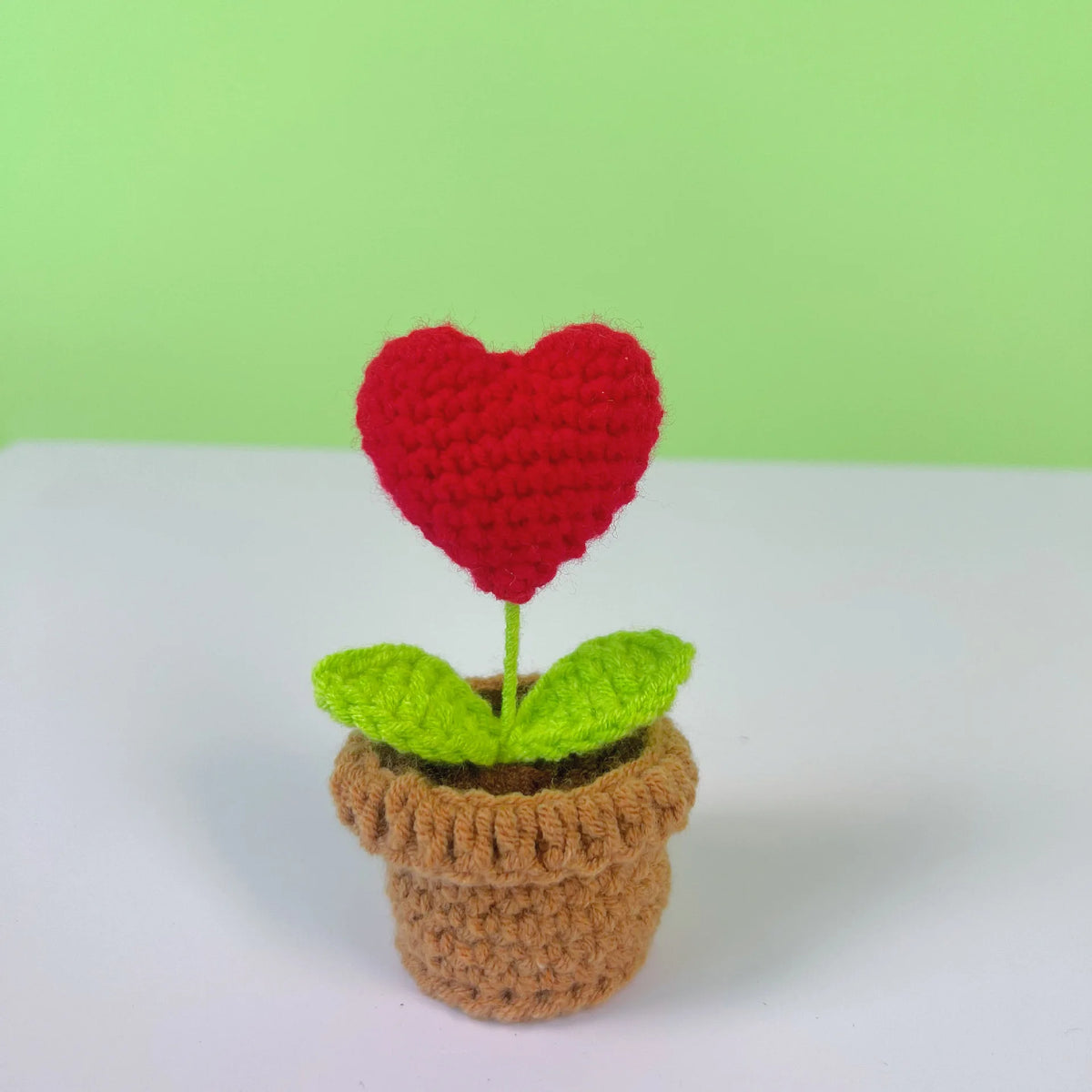 plante artificielle crochetée pot rouge feuilles vertes intérieur décoration mariage anniversaire