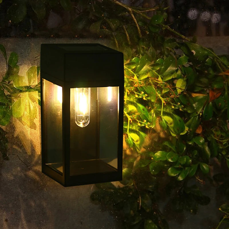 lampe murale solaire led moderne noire transparente éclairage extérieur hydrofuge autonomie warm light