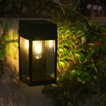 lampe murale solaire led moderne noire transparente éclairage extérieur hydrofuge autonomie warm light