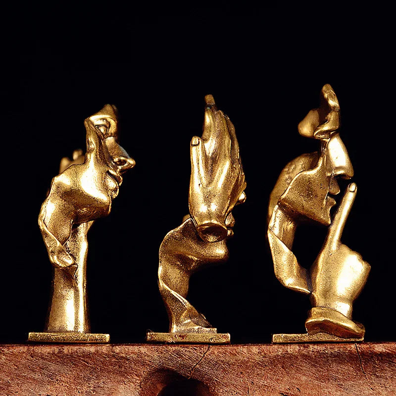statuette abstraite dorée sculpture visage stylisé moderne décoration salon maison