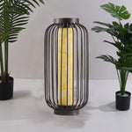 lanterne moderne éclairage extérieur led ip65 noir jaune clair texture marbrée minimalisteflux lumineux faible