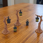 lanterne décorative miniature tronc naturel détails dorés suspendue brunes dorées forêt
