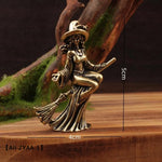 statuette féminine sorcière robe longue baguette magique balai art deco bronze doré intérieur