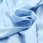 parure lit drap housse élastique soie glacée oreillers coton frais bleu clair uni