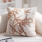 taies d'oreiller patchwork moderne motifs brodés couleurs variées géométriques fleurs beige marron noir blanc