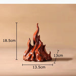 sculpture moderne flamme rouge brillante effet métallique pied bois doré