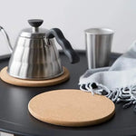 tapis table bois liège durable antidérapant silencieux protection surface ronde minimaliste naturelle rustique