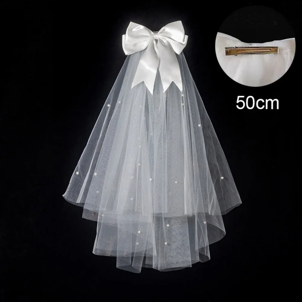 voile mariée blanc translucide détails floraux classique clips inclusion élégant