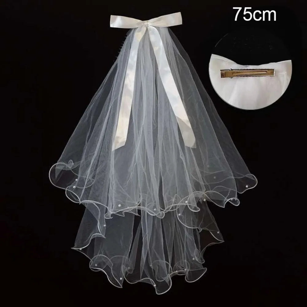 voile mariée blanc translucide détails floraux classique clips inclusion élégant