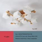 lampe moderne bois verre cubes géométriques blanc doré 10 15 mètres carrés
