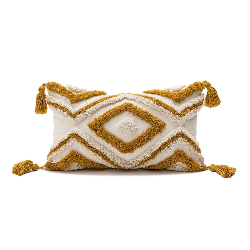 coussin décoratif boho chic blanc bleu marron beige doré motifs géométriques pompons coton