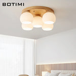 lampe moderne bois blanc abat jour verre motifs plissés éclairage chambre coucher