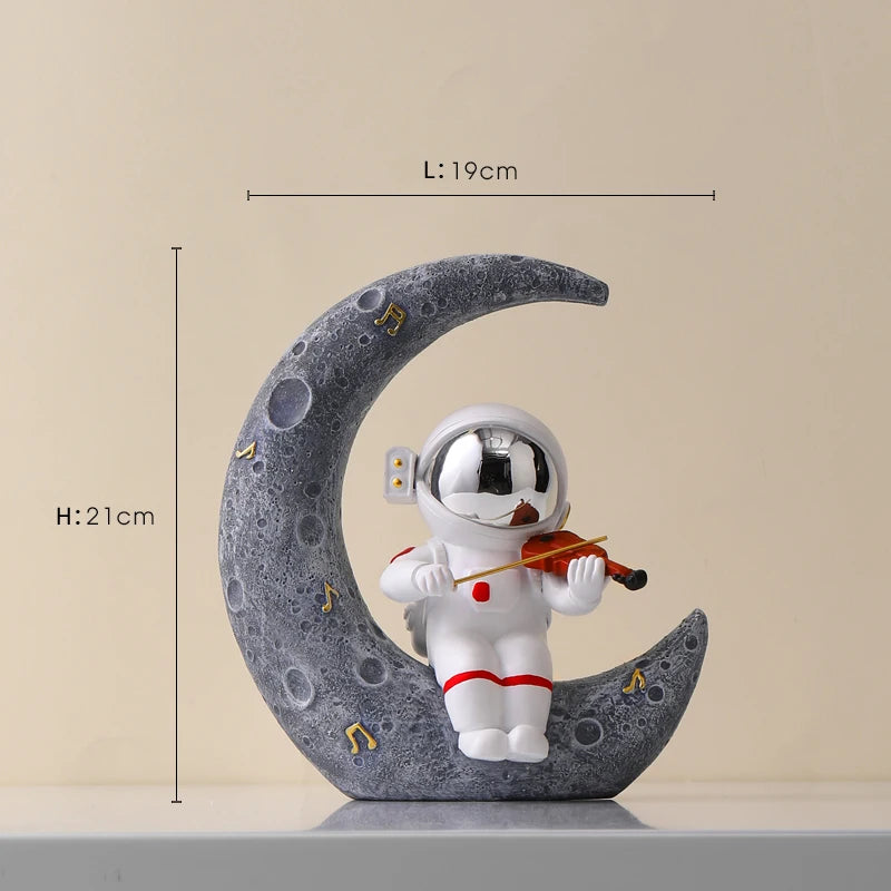 statue astronaute résine saxophone doré guitare violoncelle moderne décoration intérieure chambre salon