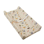 tapis changement bébé beige bleu clair imprimé dinosaures poissons ceinture sécurité moderne pratique